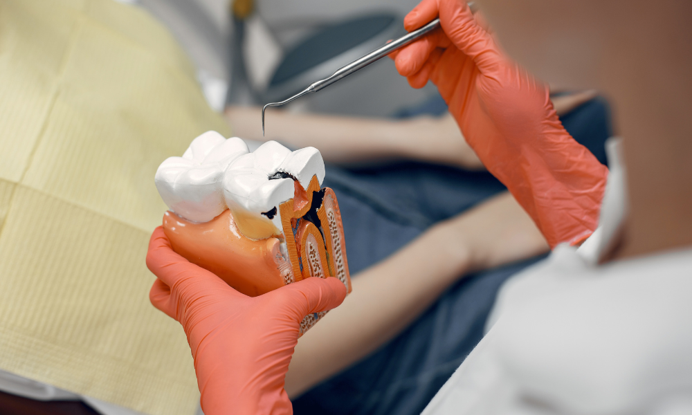Tratamento de desvitalização de dente realizado em consulta de medicina dentária.